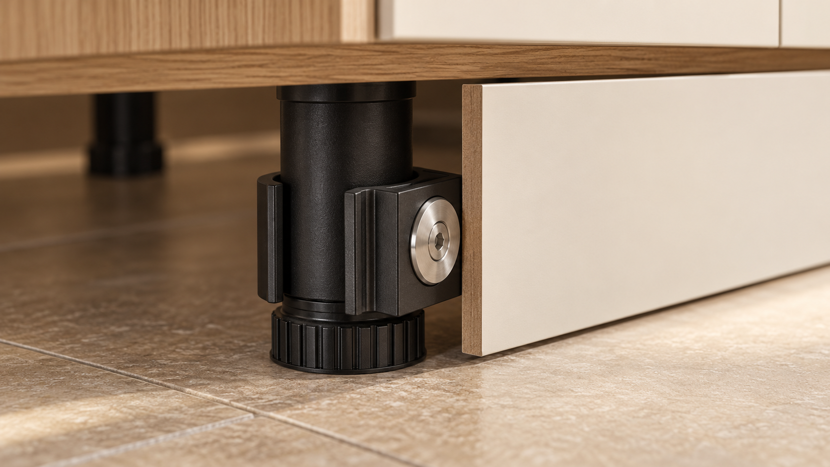 Concept render showing PlinthFix on a cabinet leg behind a white kitchen kickboard pulled forward for access